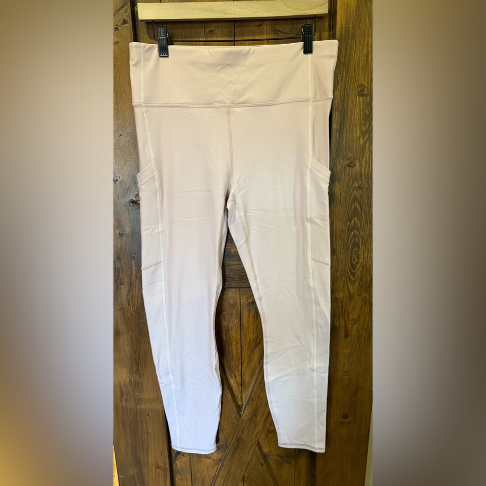 Fabletics High Waisted Cold Weather Pocket Leggings in Muted Mauve/Ecret